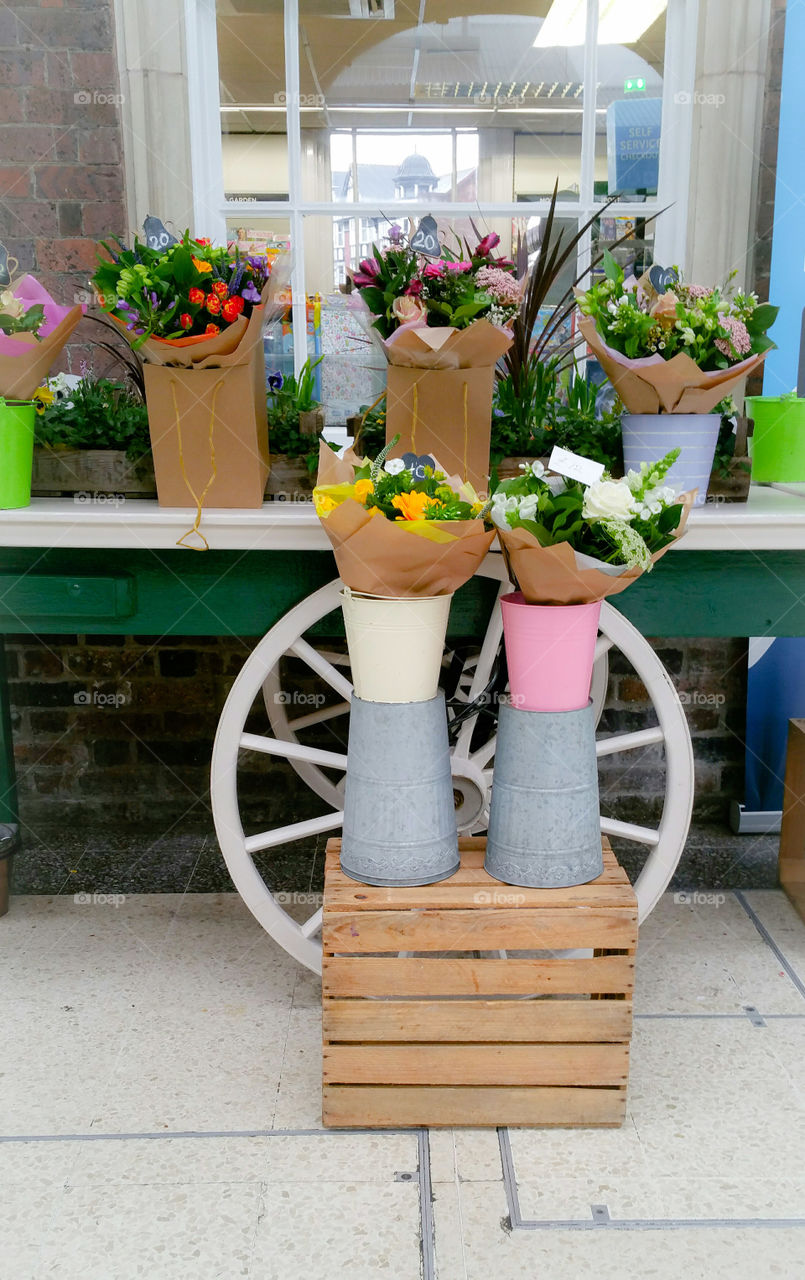 Bouquets at a station florist display
