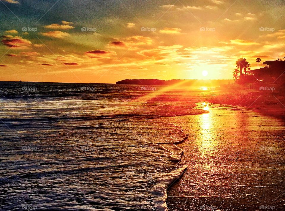 Sunset Reflection in the Wet Sand