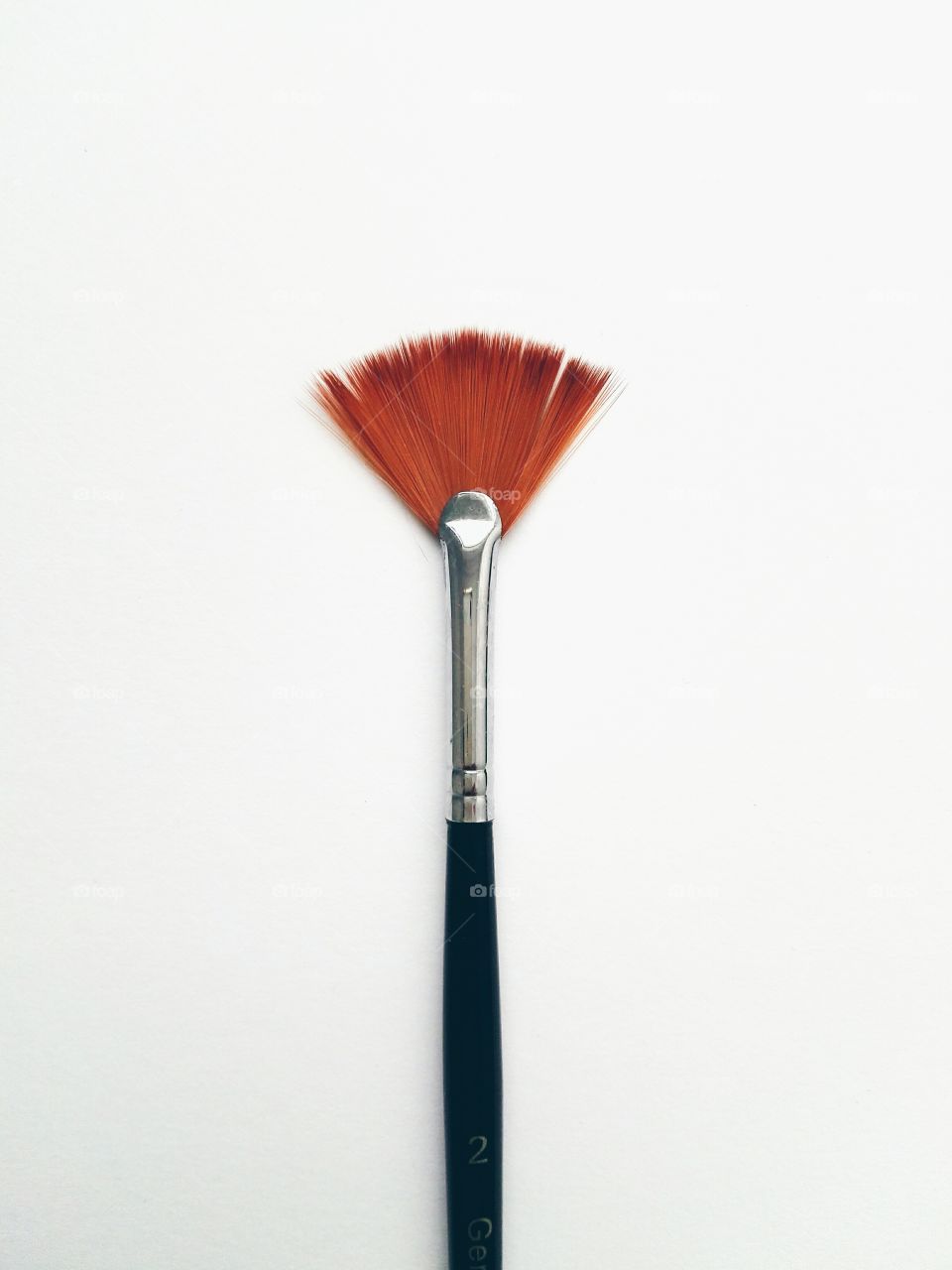 Orange brush on white background