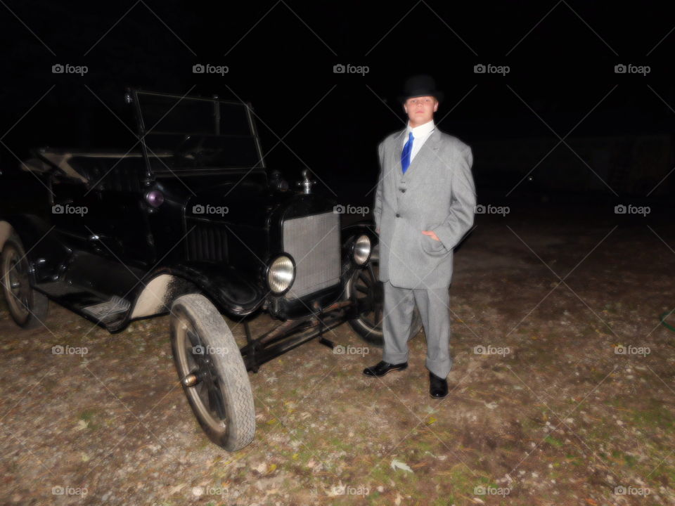 young man and model T