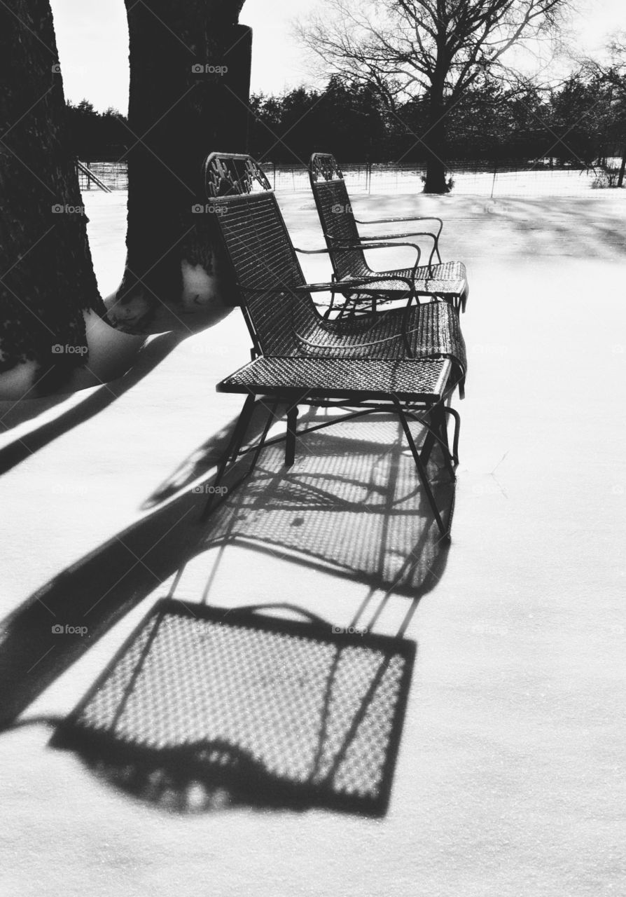 Shadows of Frozen Lawn Furniture in the Snow