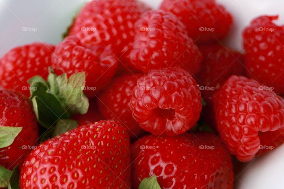 Close-up of raspberries and strawberries