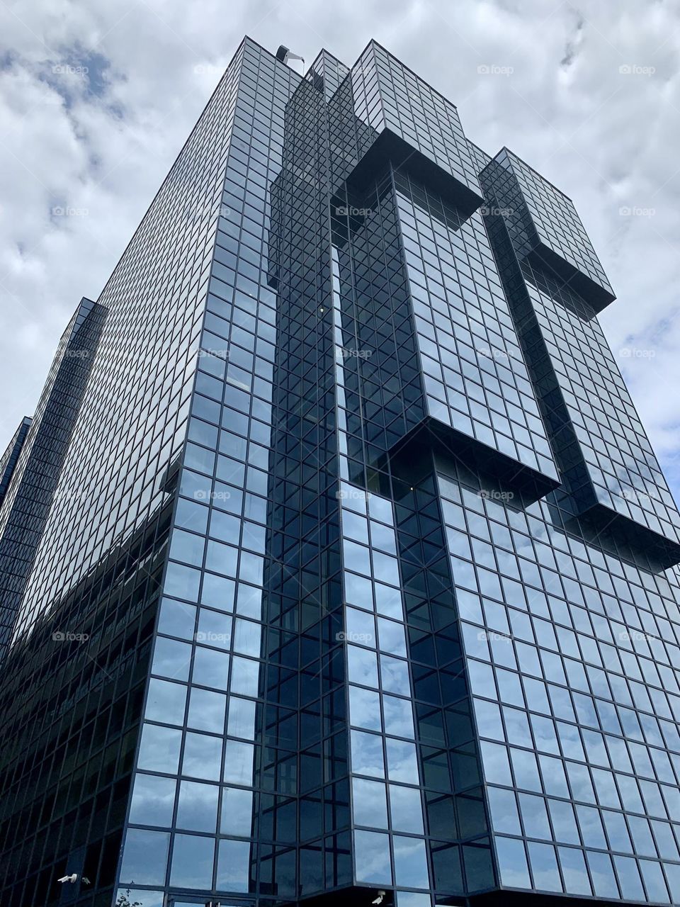 Low angle view of modern skyscraper in London, geometry in architecture, minimalism 