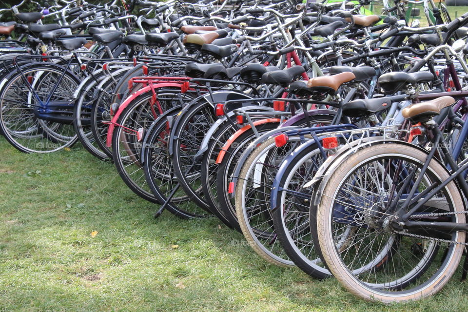 Many bicycles parked