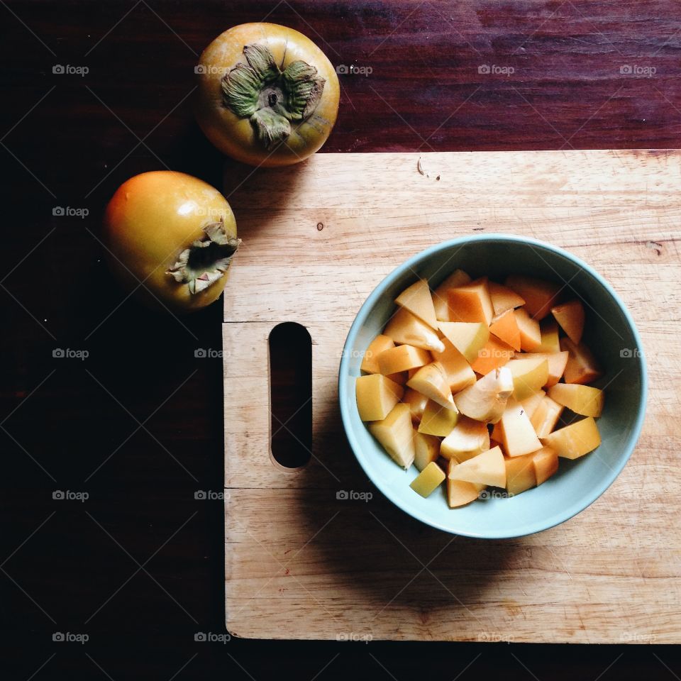 Persimmons in a bowl