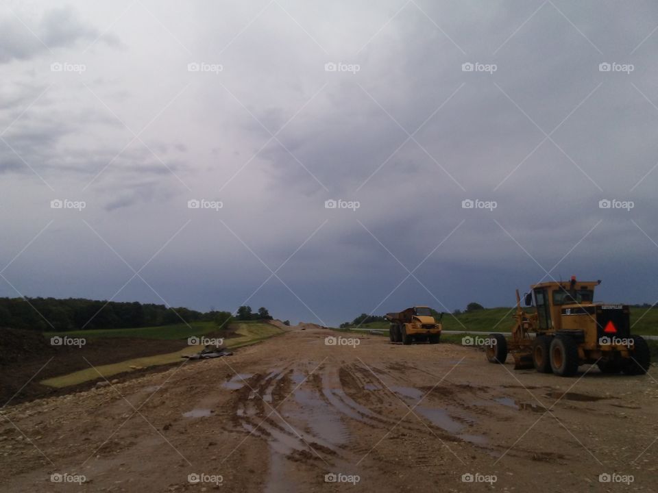 Another view of the future Westbound lanes of WIS 23 just East of Ridge Road during some rainfall West of Plymouth, Wisconsin.