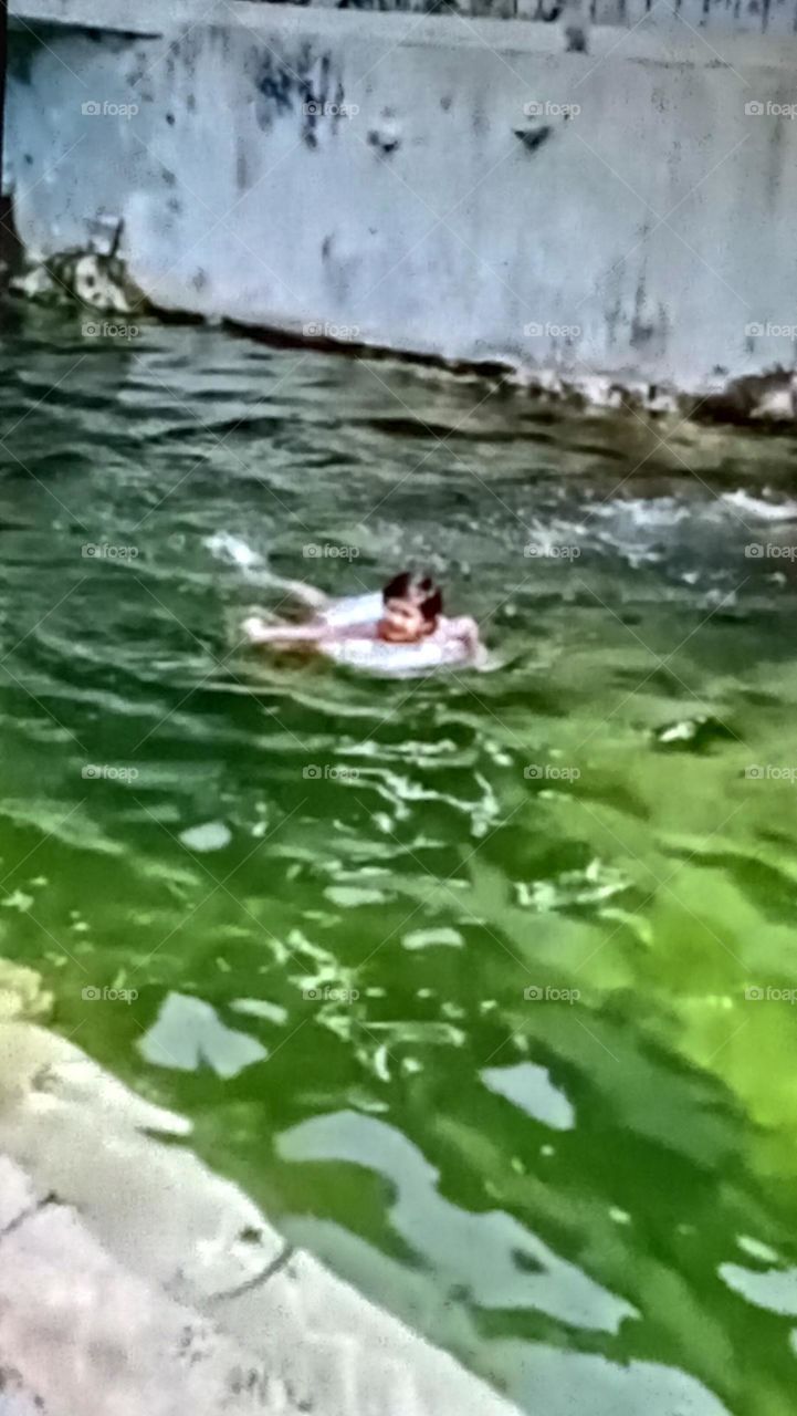 brighter kid learning swimming! great achievement!!