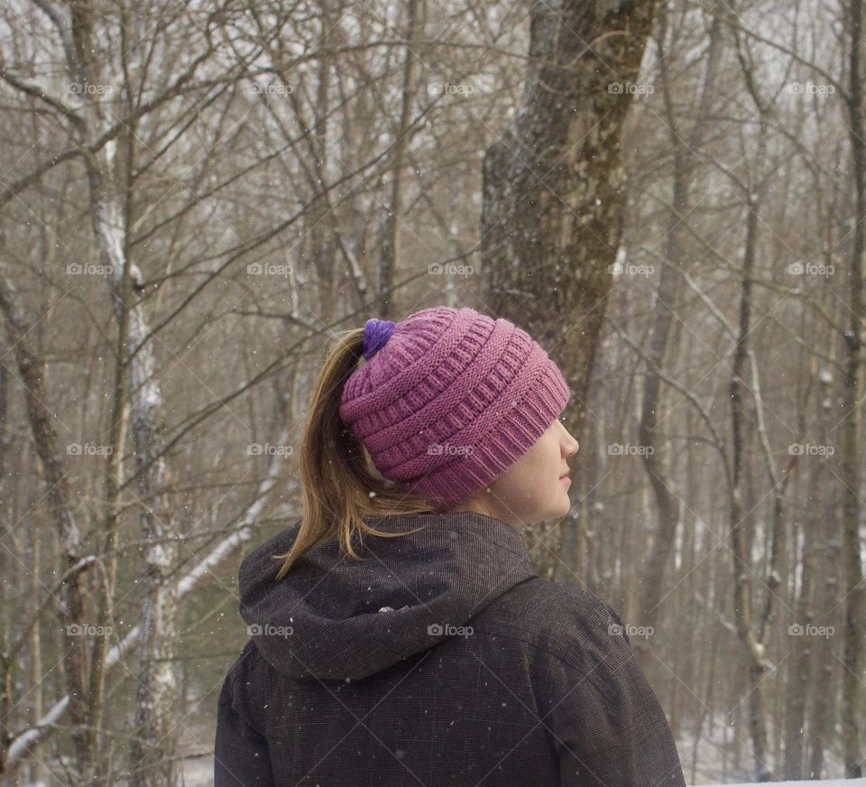 A warm, mauve, knitted hat