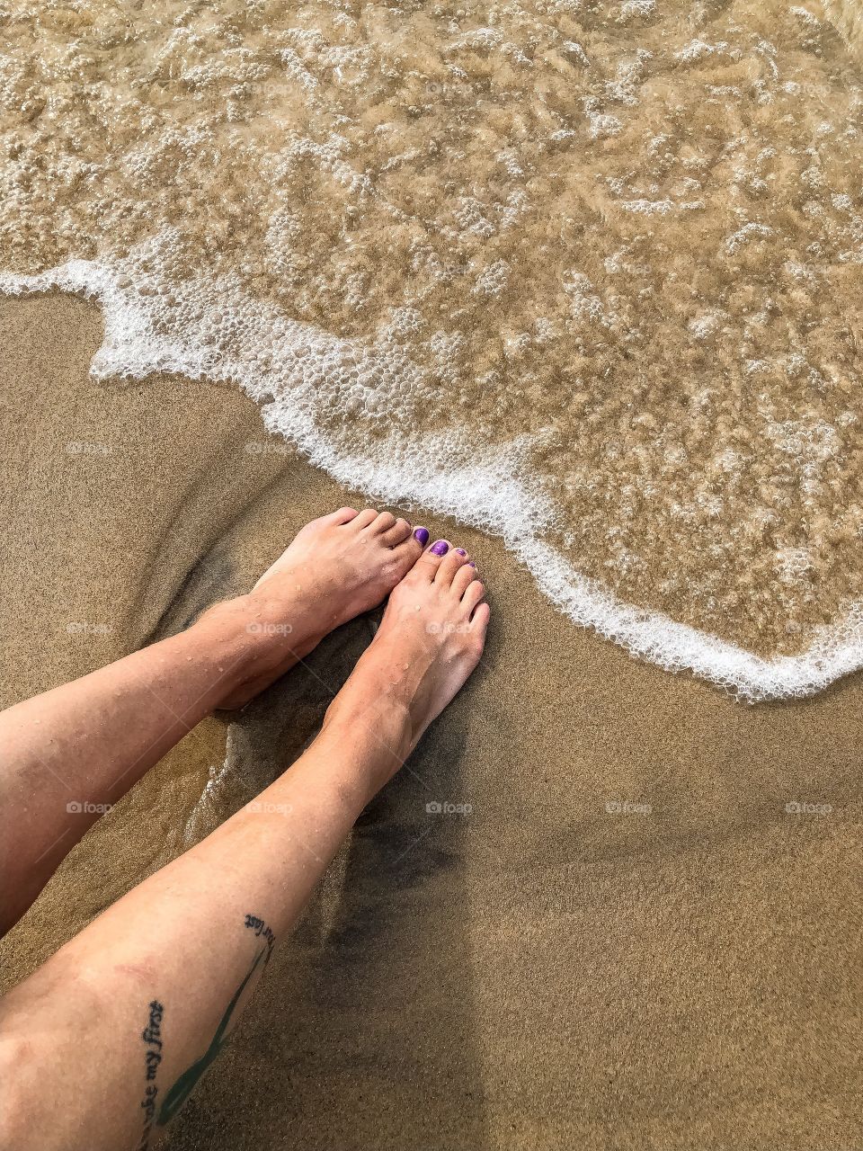  Feet in the sand