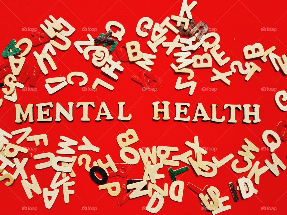 mental health lettering on red background