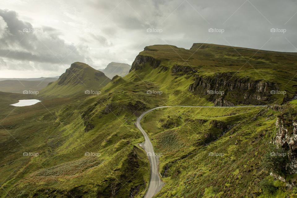 A view of the Quiraing on the Isle of Skye with its lush and green rolling hills in the distance!