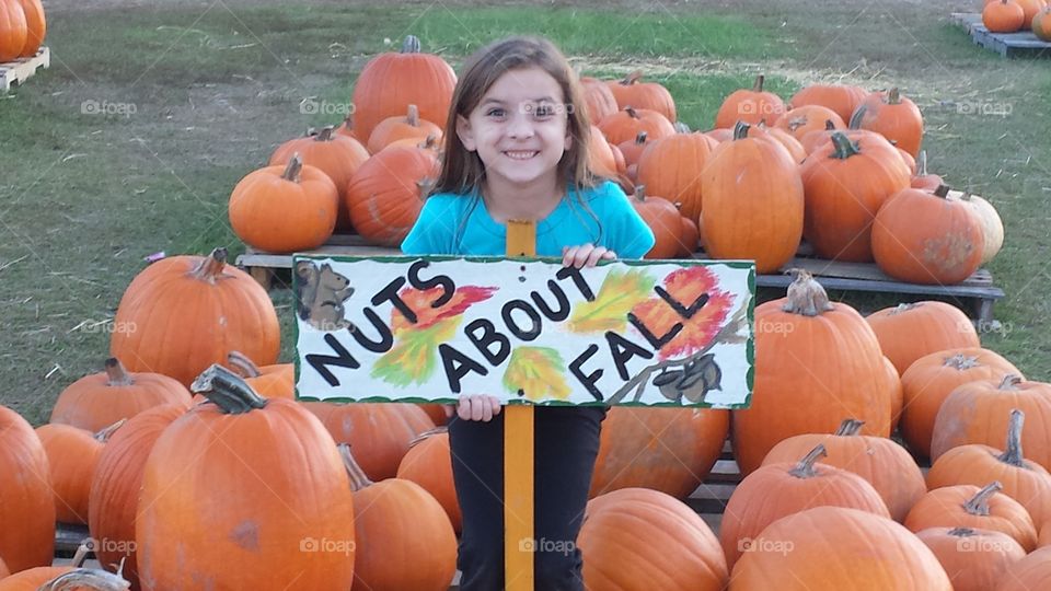 Nuts About Fall. My beautiful daughter in the pumpkin patch