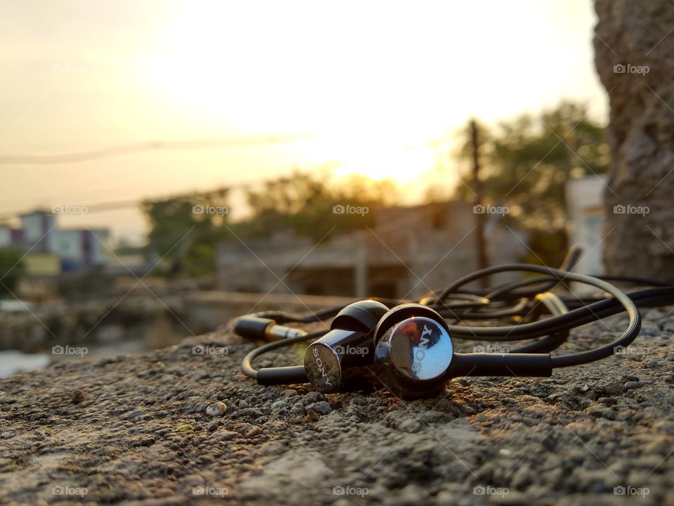 Earphone of the SONY at a great sight of sunset