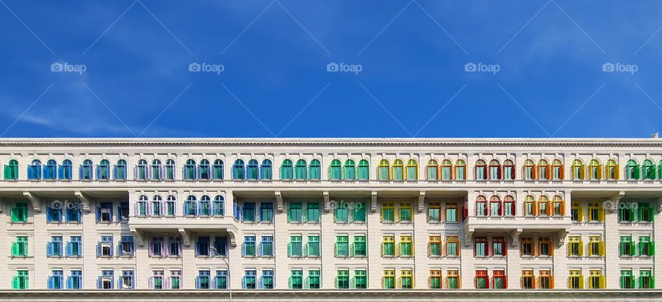 Coloured windows architecture against the blue sky