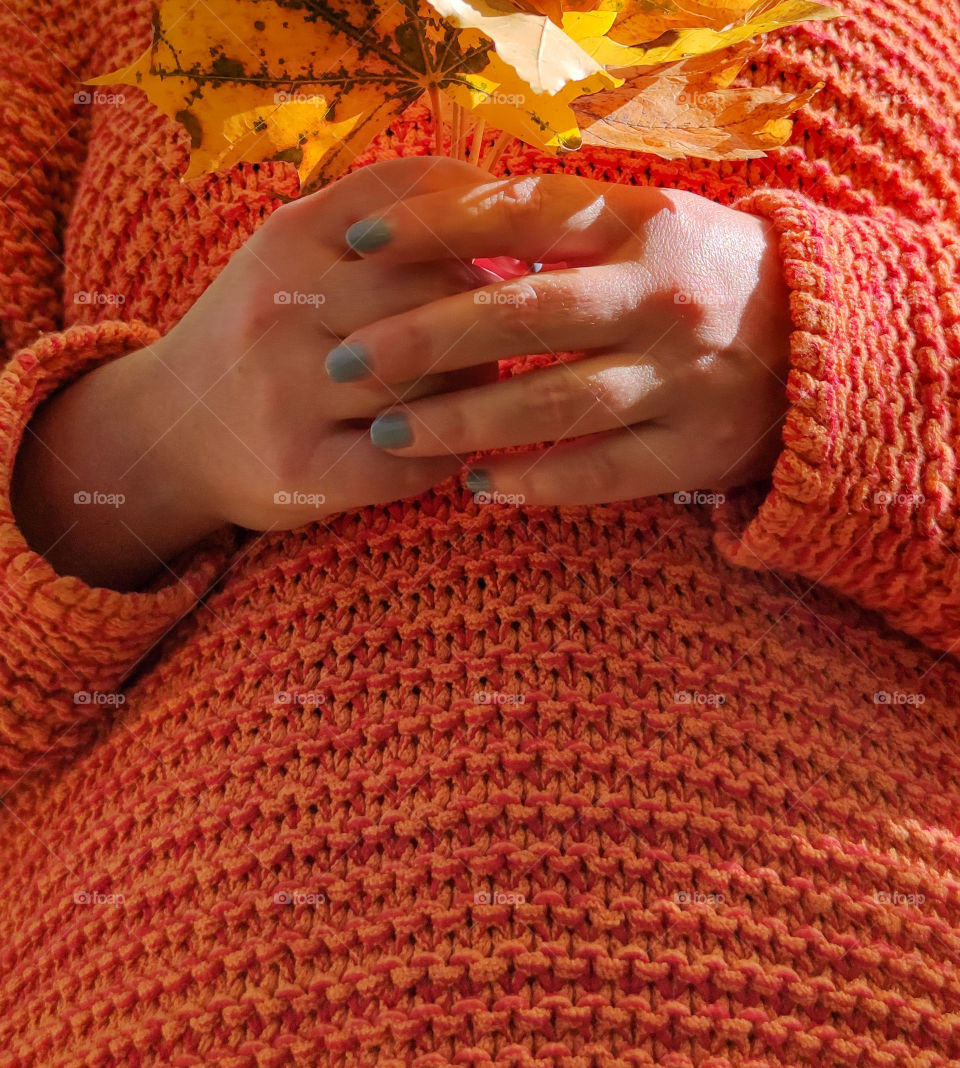 Orange sweater autumn like texture