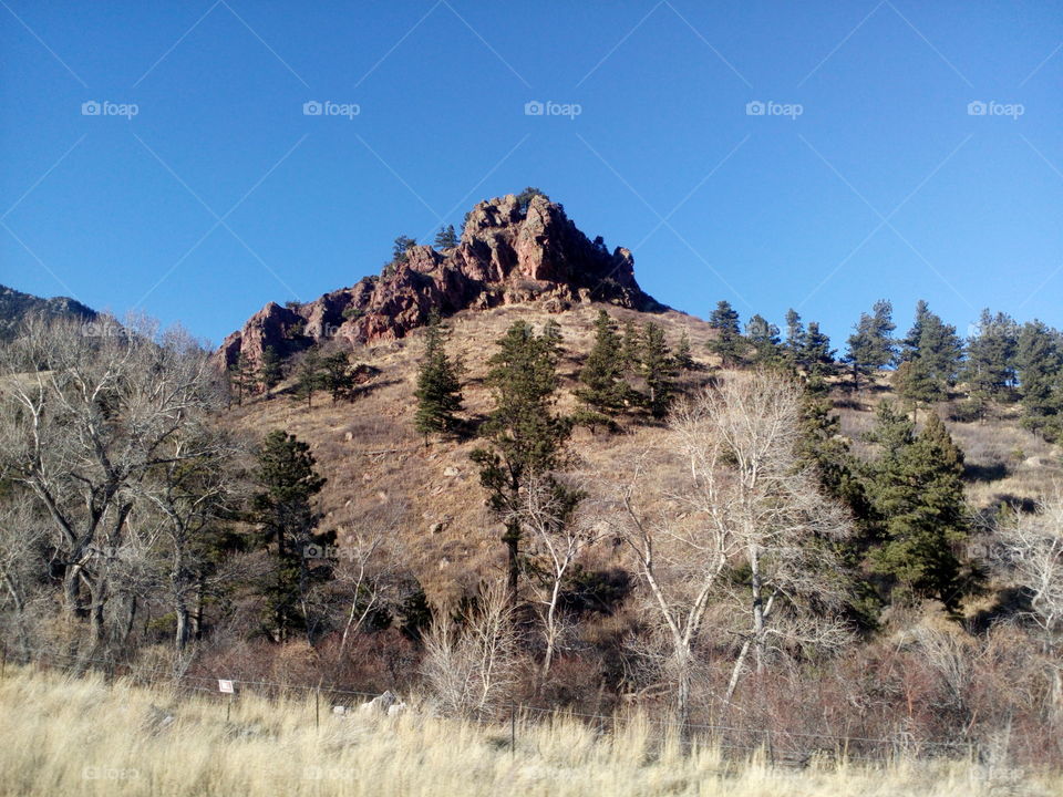 Colorado mountain scene with rocks at top
