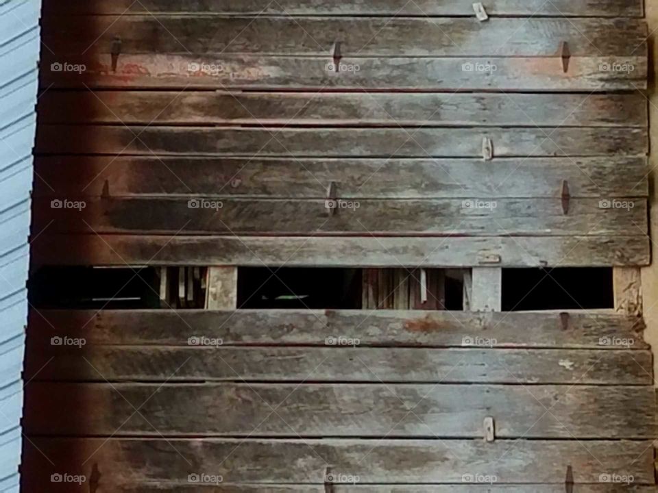 This is a close up of a rustic shed.