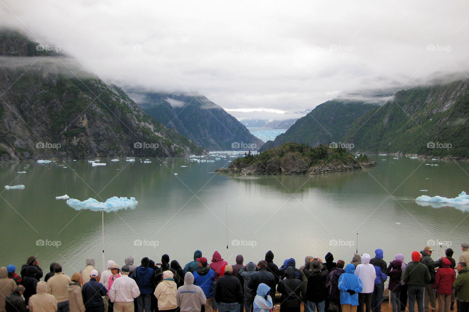 Tourists viewing the Sawyer Glacier in Trac Arm fjord in Alaska