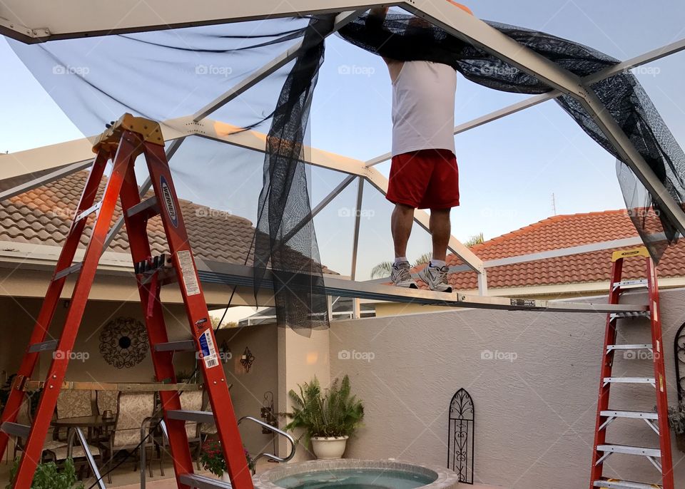 Repairing pool cage screen 