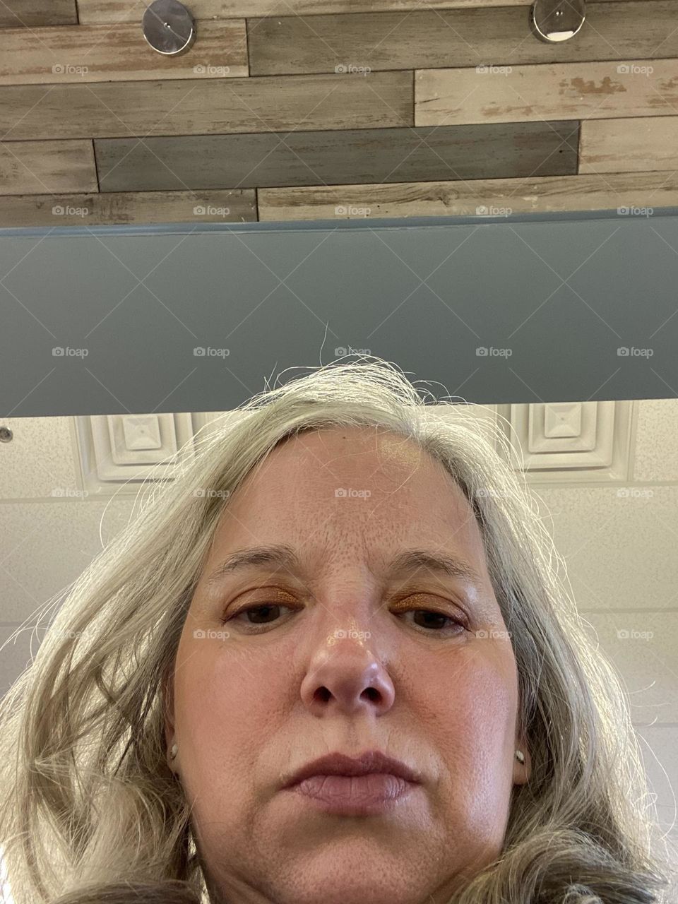 A photo of myself taken one Saturday morning while sitting at the counter of a favorite breakfast spot called Meemom’s. Just playing around while waiting for my coffee and food. Only then will I be fully awake!