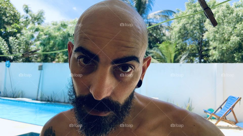 Man with beard looking at camera 