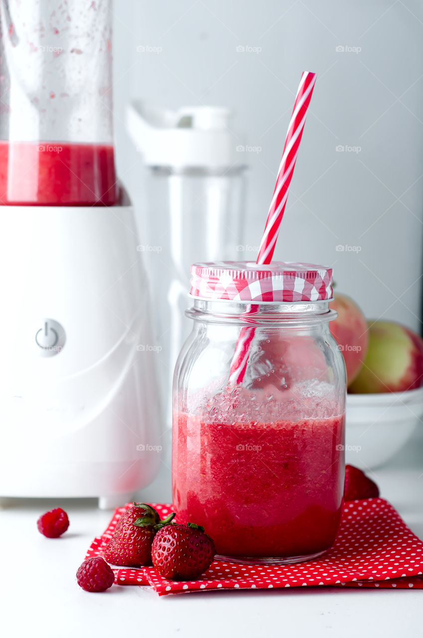 Delicious fruits smoothie in a jar