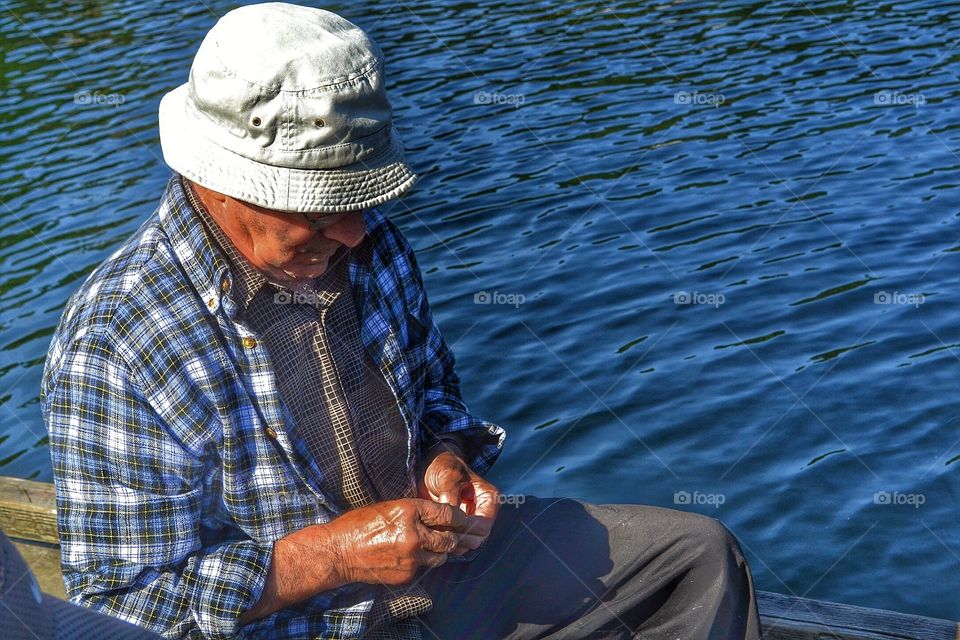 Fisherman in the morning glow. Fisherman in the morning glow of the sun