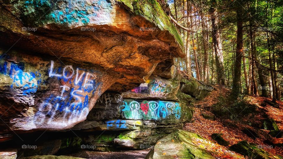 Graffiti rocks at Dundee Falls in Dundee Ohio