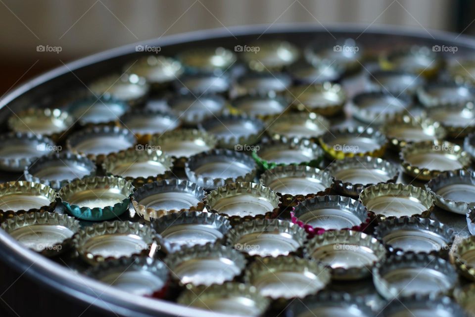 Close up of many bottle caps