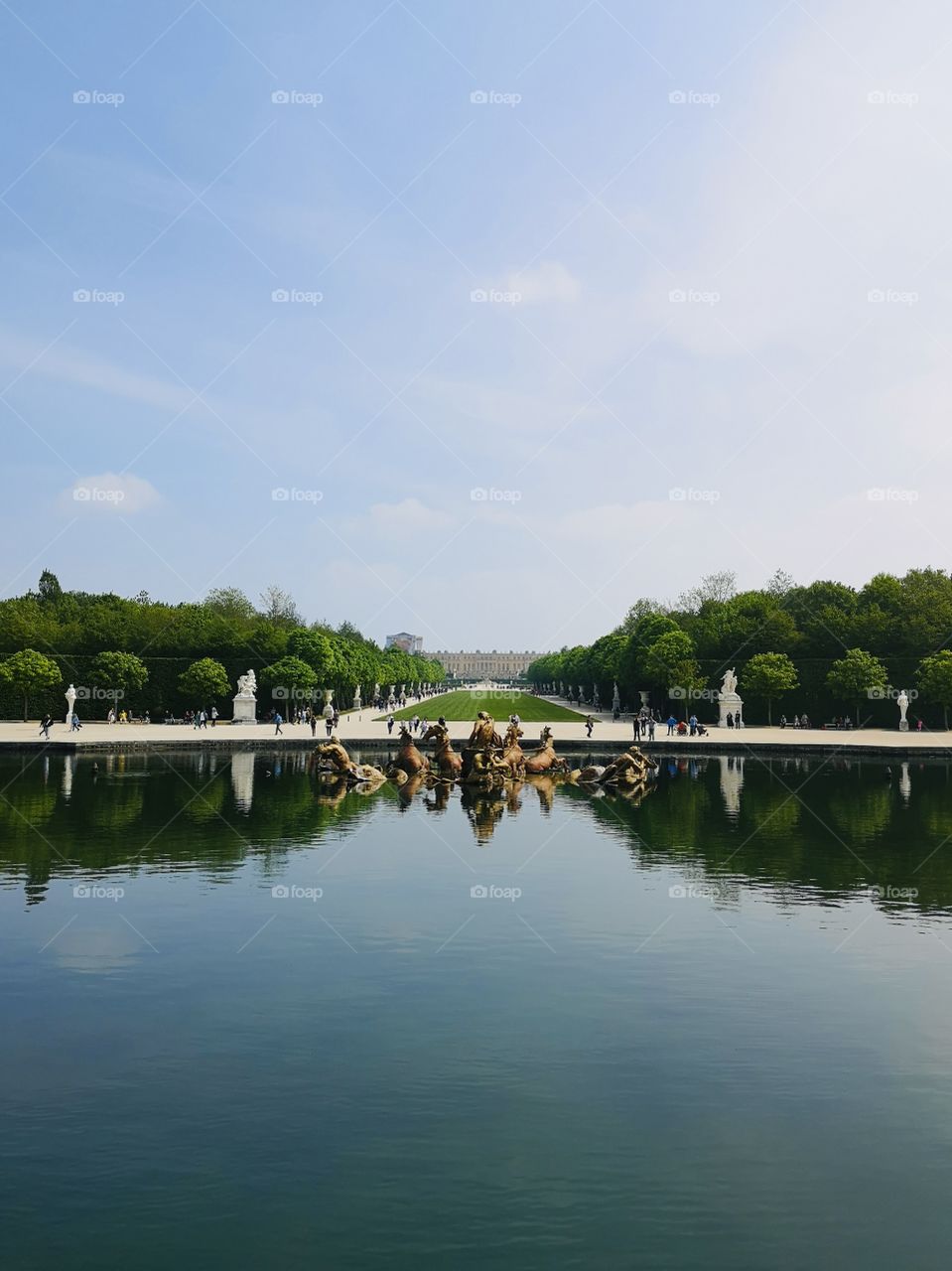 The garden of the Palace of Versailles on the reflection of the lake