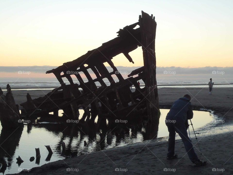 capturing a shipwreck at dusk