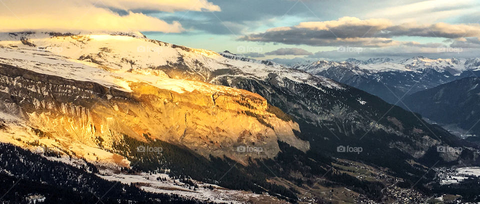 Swiss Alps golden looking part of the mountain during sunset