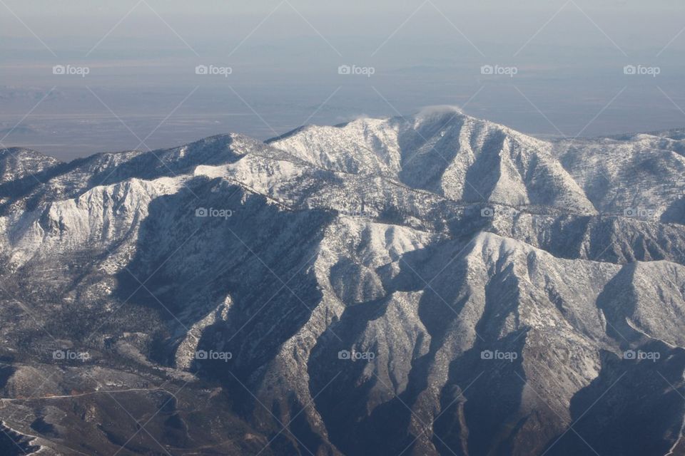 High angle view of snow capped mountain