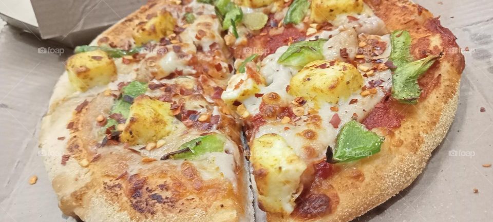 Pizza 🍕😋 delicious food made in occasion celebration 🎉🥳 and also daily we can eat when we hungry 🤠 very tasty food, cheese and healthy 😋😊 must visit cafetree!😊