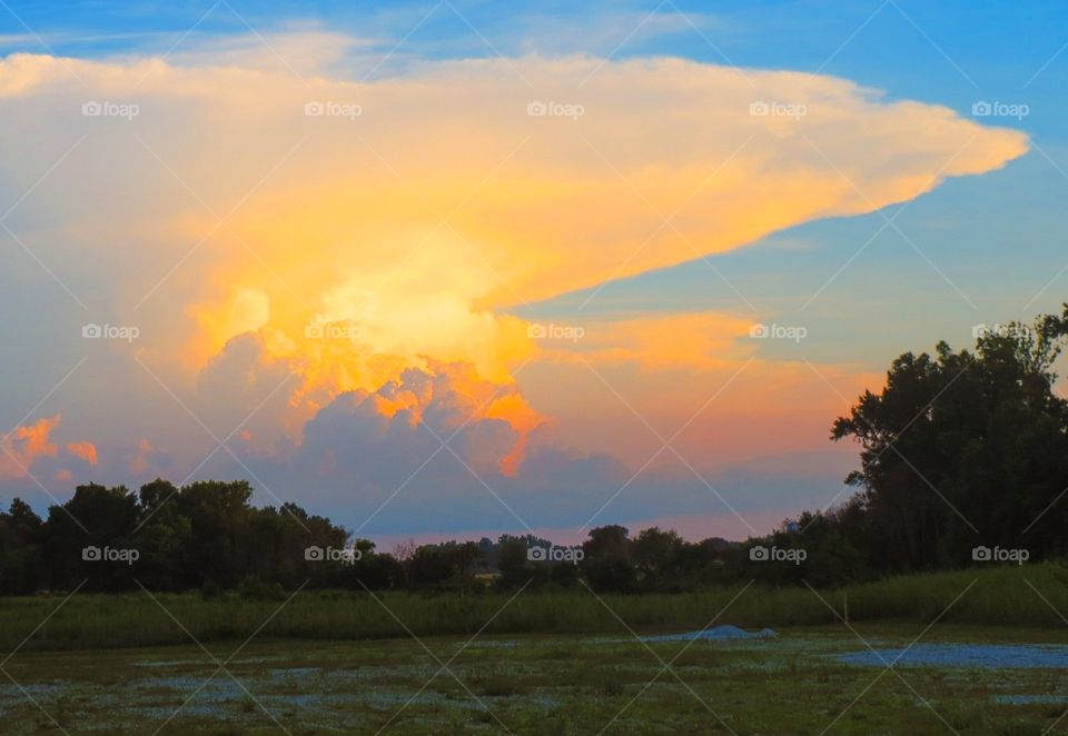 Sunset on the trail . Evening hike yields beautiful sunset at trail end.  Nice reward!