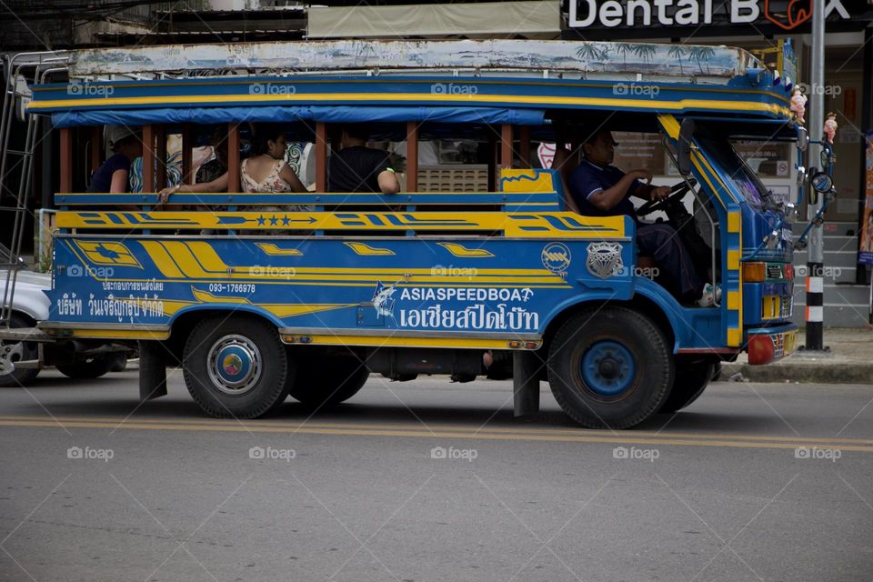 Thailand mini bus transportation. Equipped with benches. Designed to carry passengers and usually along a fixed route and according to schedule