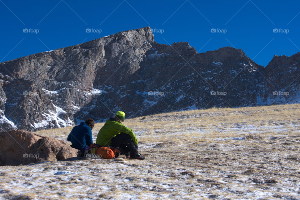 People sitting and eating near the Sawtooth Ridge in Colorado.