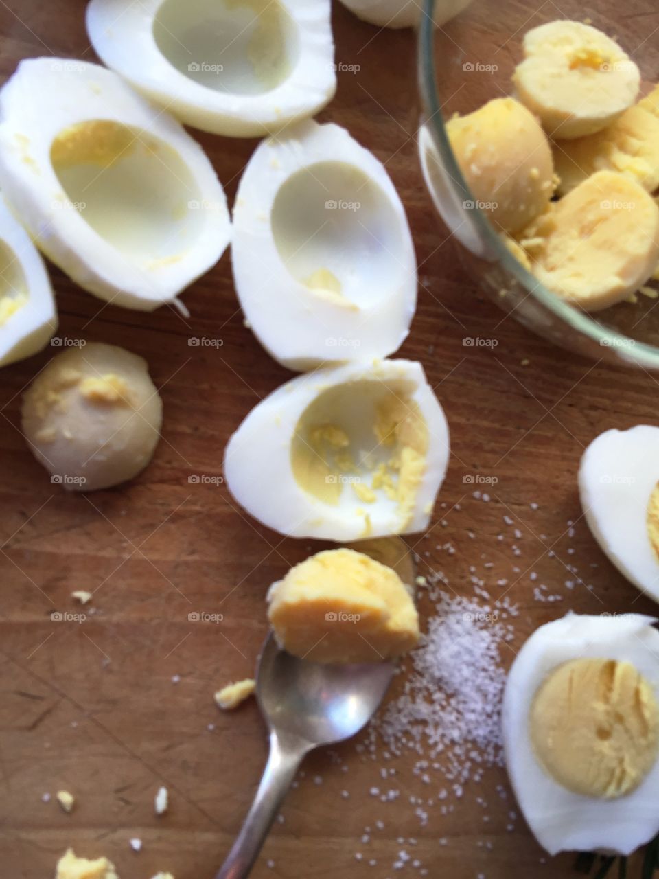 Removing yolks from boiled egg
