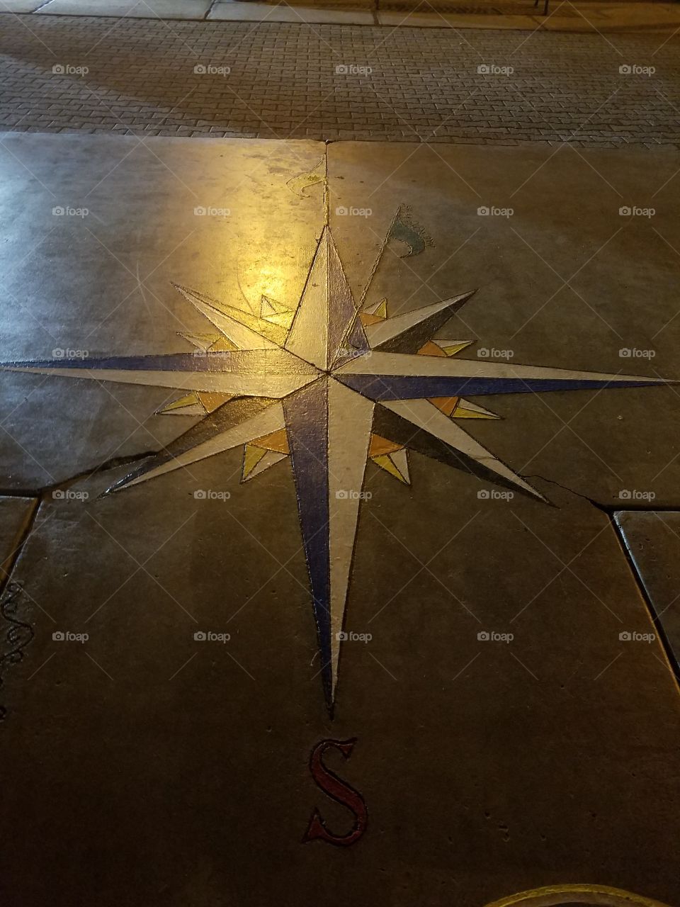 Decorative Compass on the Ground