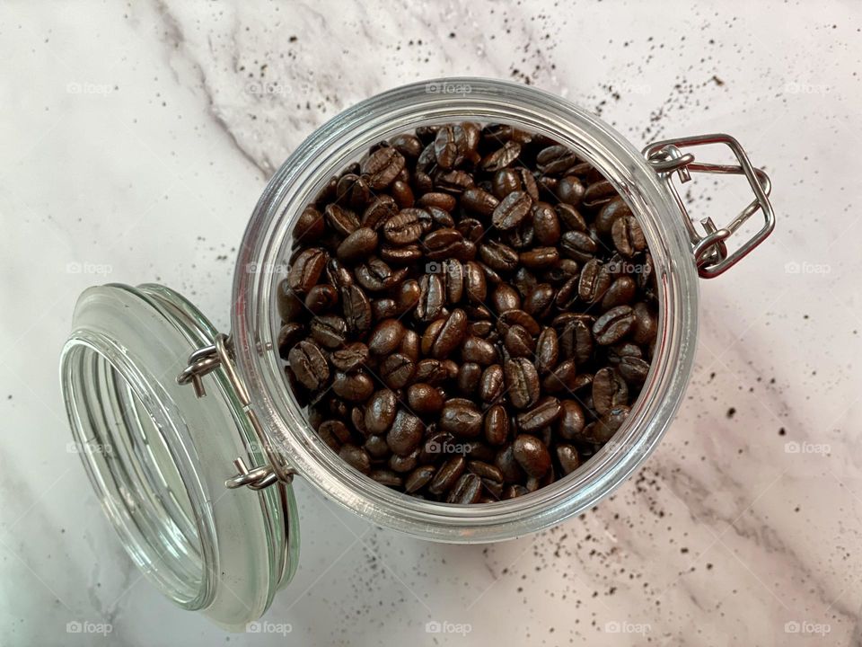 Glass jar full of coffee beans