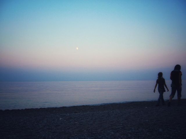A walking couple in a beautiful evening.
