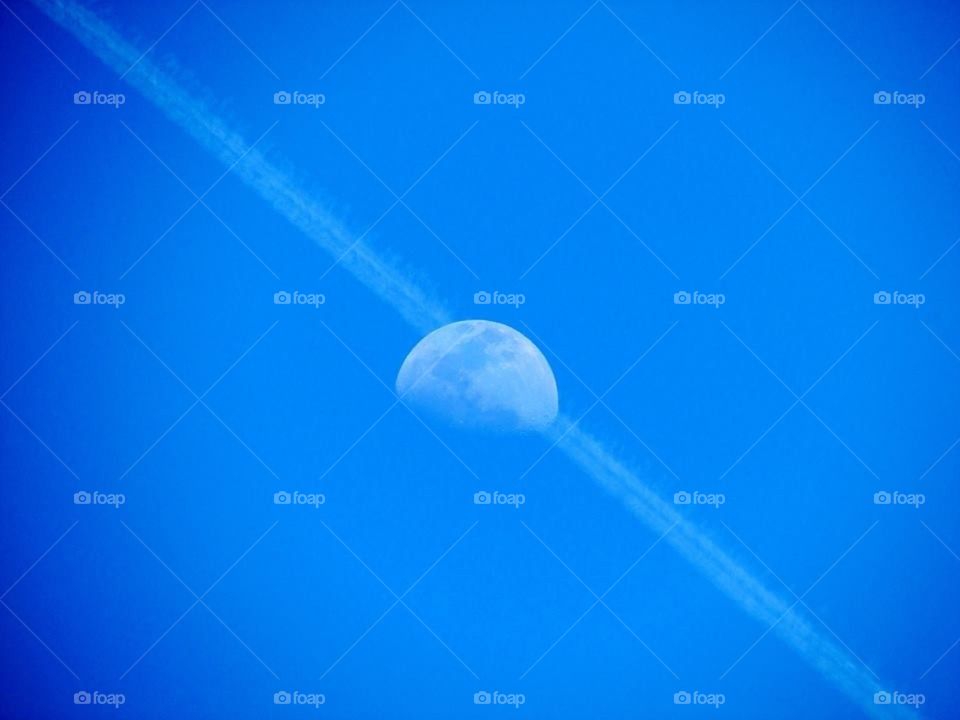 Moon and Vapor trail