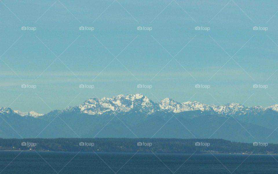 Snow capped mountain range