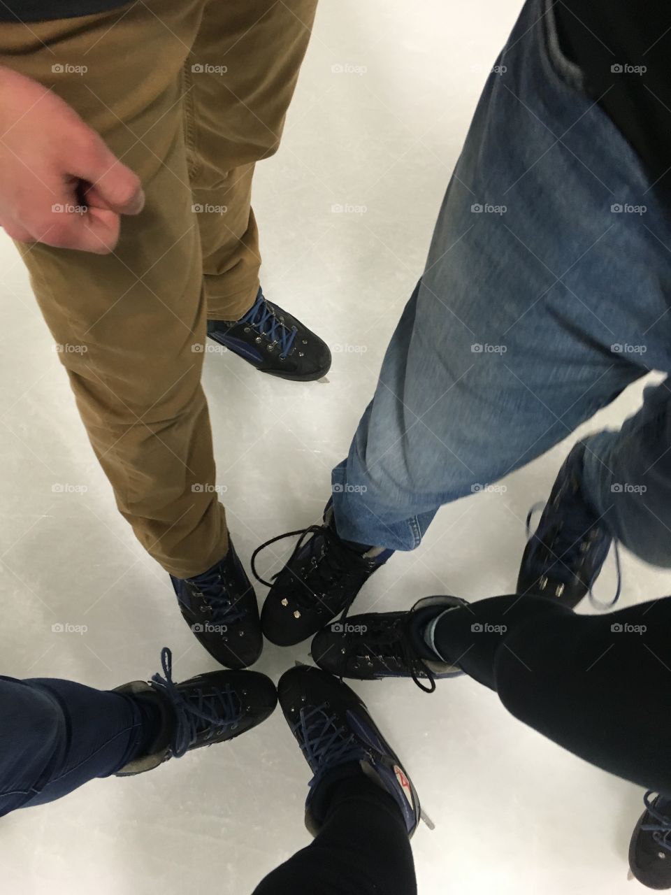 Five ice skating 
