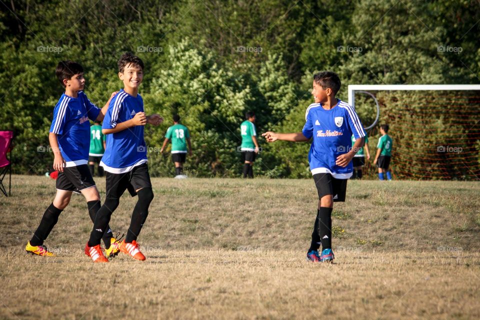 Happy soccer players