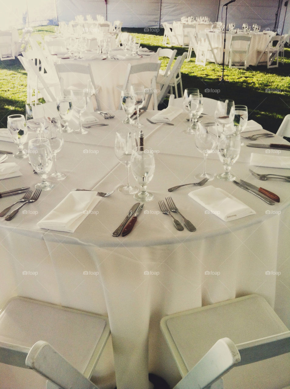 Large round tables at a banquet function.