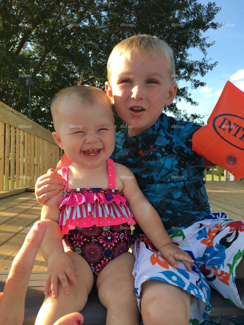 Portrait of happy brother and sister