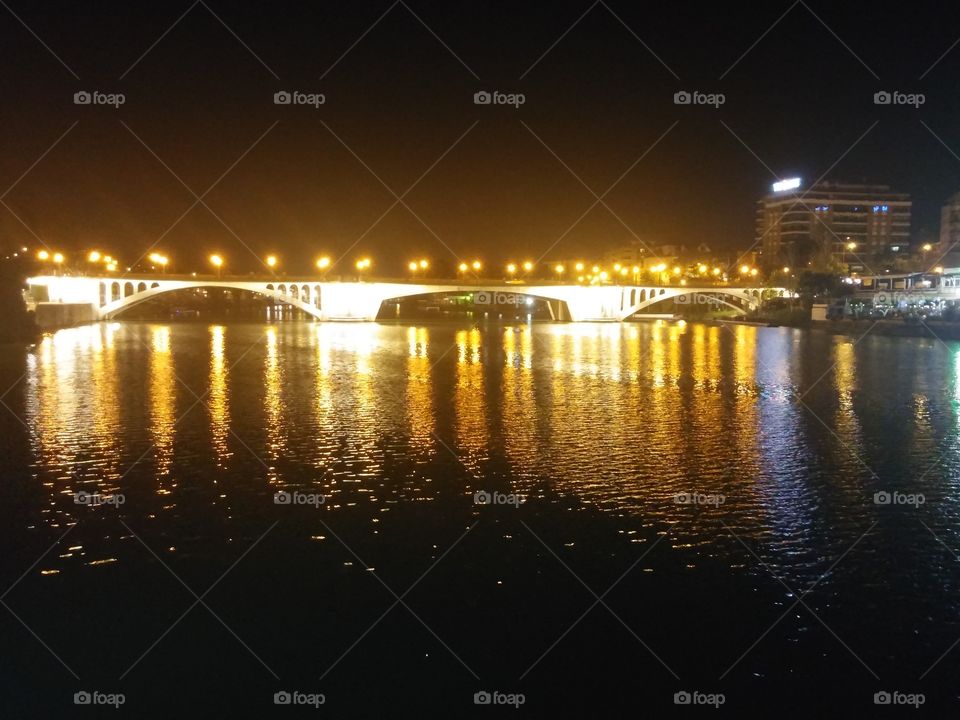 triana bridge. Sevilla in the night