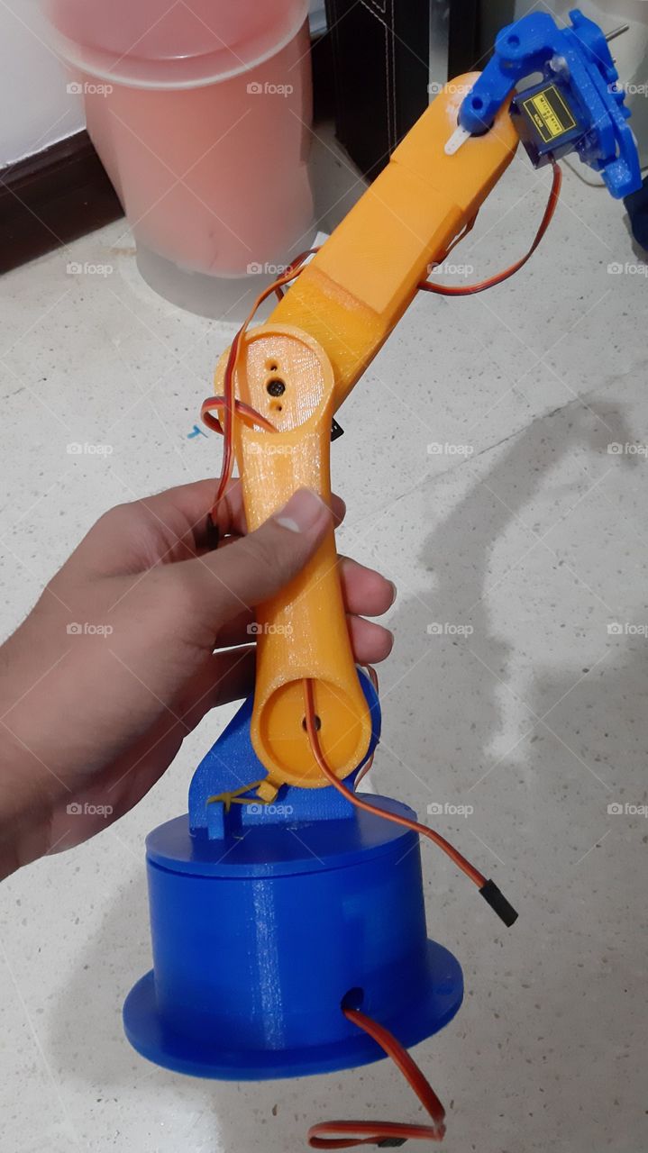 Orange Coloured 3d printed Robotic Arm with servos mg69r hand holding
