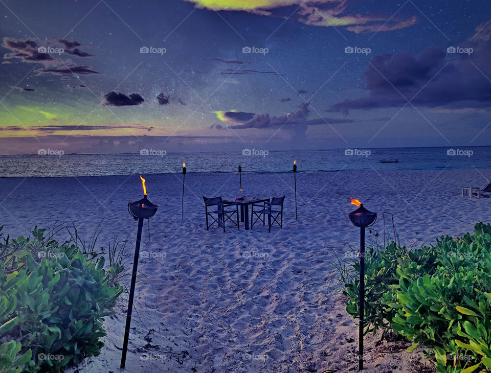 Dinner at the beach at night